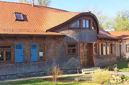 Sichelförmiges Haus in Hessen